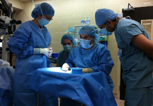 Performing Corneal Transplants under Dr. Deng's supervision